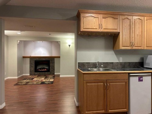 151 Citadel Green Nw, Calgary, AB - Indoor With Fireplace