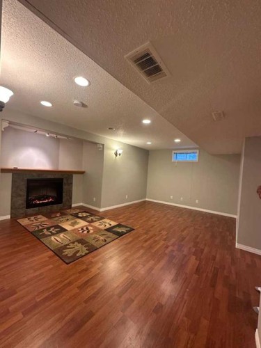 151 Citadel Green Nw, Calgary, AB - Indoor With Fireplace