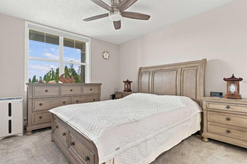 208-25 Prestwick Drive Se, Calgary, AB - Indoor Photo Showing Bedroom