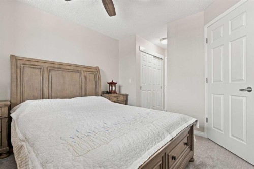 208-25 Prestwick Drive Se, Calgary, AB - Indoor Photo Showing Bedroom
