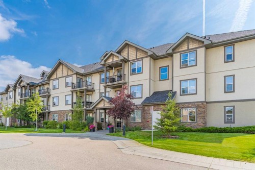 208-25 Prestwick Drive Se, Calgary, AB - Outdoor With Balcony With Facade