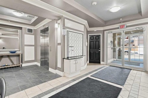 208-25 Prestwick Drive Se, Calgary, AB - Indoor Photo Showing Other Room
