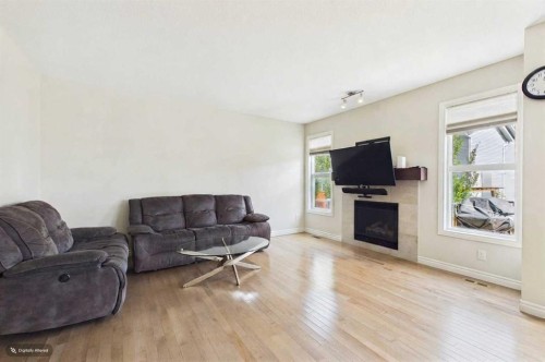 66 Nolanhurst Way Nw, Calgary, AB - Indoor Photo Showing Living Room With Fireplace