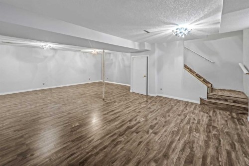227 Manora Crescent Ne, Calgary, AB - Indoor Photo Showing Other Room