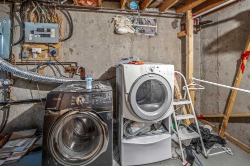 227 Manora Crescent Ne, Calgary, AB - Indoor Photo Showing Laundry Room