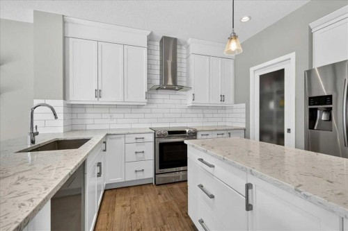 195 Mahogany Passage Se, Calgary, AB - Indoor Photo Showing Kitchen With Upgraded Kitchen