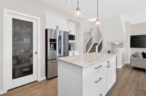 195 Mahogany Passage Se, Calgary, AB - Indoor Photo Showing Kitchen With Upgraded Kitchen