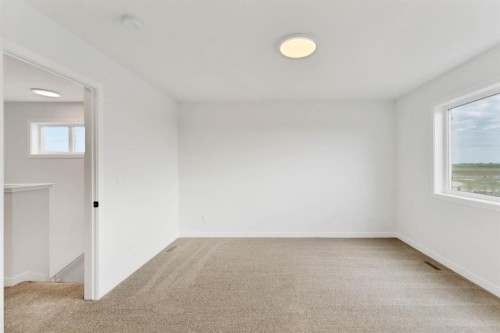 65 Lewiston Street Ne, Calgary, AB - Indoor Photo Showing Other Room