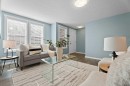 516 Auburn Bay Circle Se, Calgary, AB  - Indoor Photo Showing Living Room 