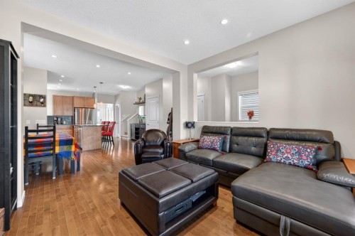 218 River Heights Green, Cochrane, AB - Indoor Photo Showing Living Room