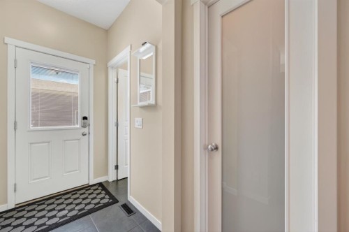 218 River Heights Green, Cochrane, AB - Indoor Photo Showing Other Room