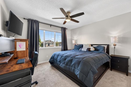 218 River Heights Green, Cochrane, AB - Indoor Photo Showing Bedroom