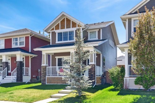 218 River Heights Green, Cochrane, AB - Outdoor With Deck Patio Veranda With Facade