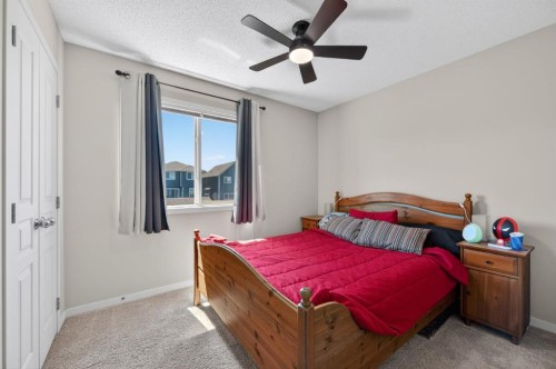 218 River Heights Green, Cochrane, AB - Indoor Photo Showing Bedroom