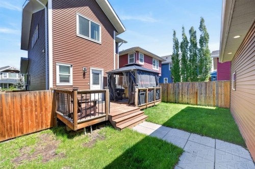 218 River Heights Green, Cochrane, AB - Outdoor With Deck Patio Veranda