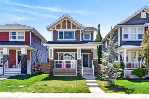 218 River Heights Green, Cochrane, AB - Outdoor With Deck Patio Veranda With Facade