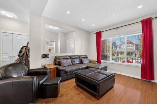 218 River Heights Green, Cochrane, AB - Indoor Photo Showing Living Room
