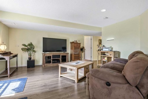 443 Riverside Green Nw, High River, AB - Indoor Photo Showing Living Room