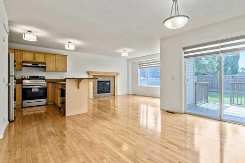 280 Panora Close Nw, Calgary, AB - Indoor Photo Showing Other Room With Fireplace