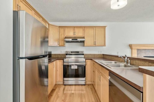 280 Panora Close Nw, Calgary, AB - Indoor Photo Showing Kitchen With Double Sink