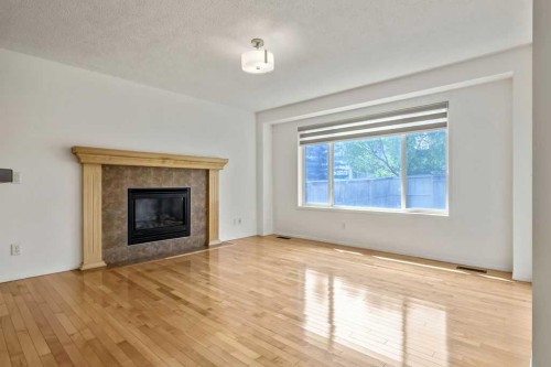 280 Panora Close Nw, Calgary, AB - Indoor Photo Showing Living Room With Fireplace