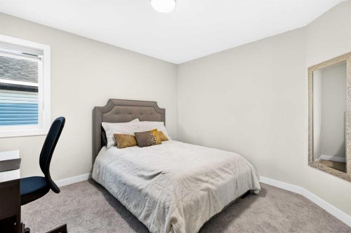 43 Hotchkiss Row Se, Calgary, AB - Indoor Photo Showing Bedroom