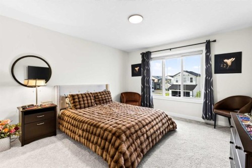 43 Hotchkiss Row Se, Calgary, AB - Indoor Photo Showing Bedroom