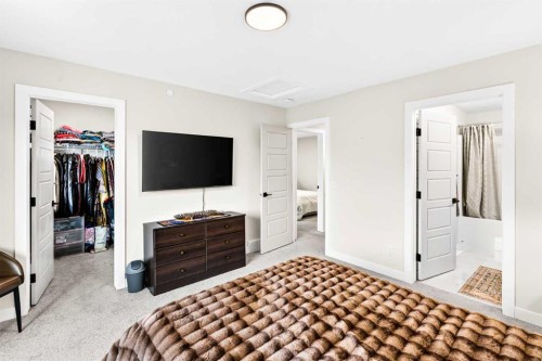 43 Hotchkiss Row Se, Calgary, AB - Indoor Photo Showing Bedroom