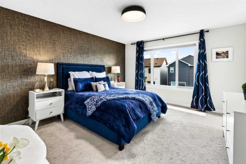 43 Hotchkiss Row Se, Calgary, AB - Indoor Photo Showing Bedroom