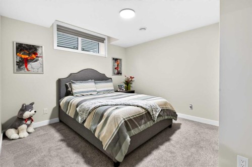 43 Hotchkiss Row Se, Calgary, AB - Indoor Photo Showing Bedroom