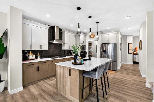 43 Hotchkiss Row Se, Calgary, AB - Indoor Photo Showing Kitchen With Upgraded Kitchen