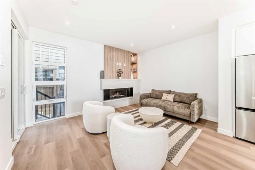 1607 37 Avenue Sw, Calgary, AB - Indoor Photo Showing Living Room With Fireplace