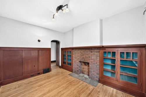 226 Superior Avenue Sw, Calgary, AB - Indoor Photo Showing Other Room With Fireplace