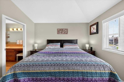 138 Copperpond Heights Se, Calgary, AB - Indoor Photo Showing Bedroom