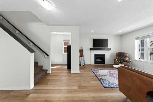 138 Copperpond Heights Se, Calgary, AB - Indoor With Fireplace