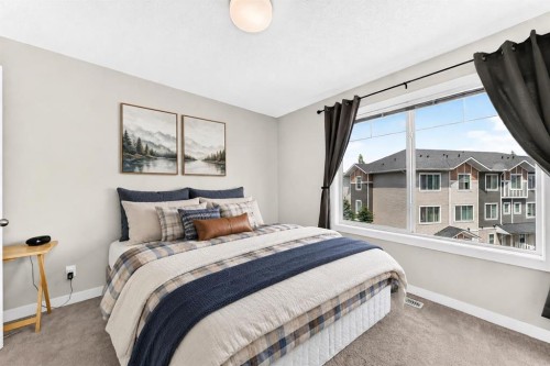 7 Stonehouse Crescent Nw, High River, AB - Indoor Photo Showing Bedroom