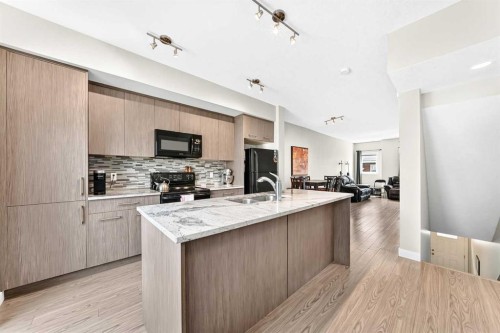 7 Stonehouse Crescent Nw, High River, AB - Indoor Photo Showing Kitchen