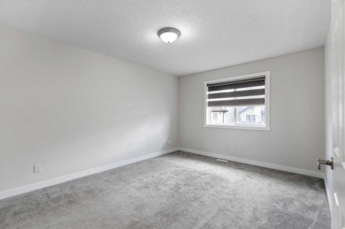 124 Saddlecrest Boulevard Ne, Calgary, AB - Indoor Photo Showing Other Room