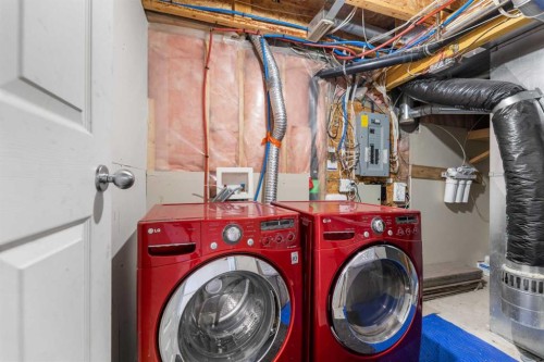 124 Saddlecrest Boulevard Ne, Calgary, AB - Indoor Photo Showing Laundry Room