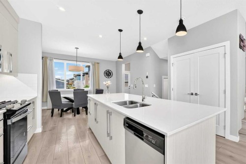 197 Chelsea Drive, Chestermere, AB - Indoor Photo Showing Kitchen With Double Sink With Upgraded Kitchen