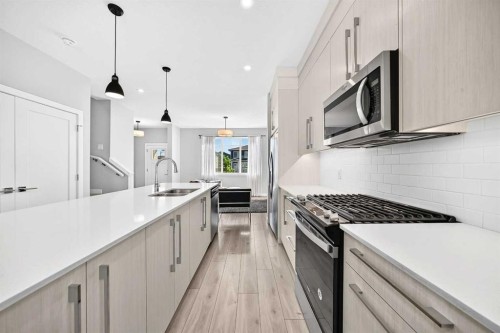 197 Chelsea Drive, Chestermere, AB - Indoor Photo Showing Kitchen With Upgraded Kitchen