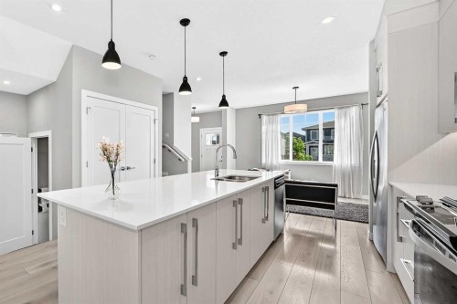 197 Chelsea Drive, Chestermere, AB - Indoor Photo Showing Kitchen With Upgraded Kitchen