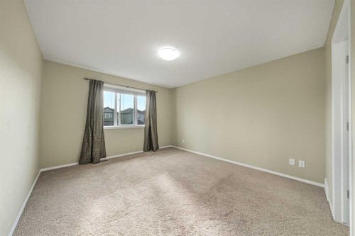 48 Panatella Common Nw, Calgary, AB - Indoor Photo Showing Other Room