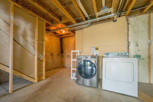 48 Panatella Common Nw, Calgary, AB - Indoor Photo Showing Laundry Room