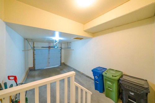 48 Panatella Common Nw, Calgary, AB - Indoor Photo Showing Garage