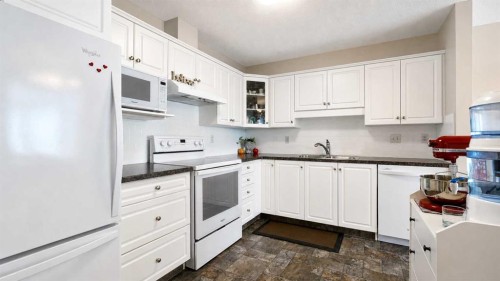 515-3515 Hawksbrow Point Nw, Calgary, AB - Indoor Photo Showing Kitchen