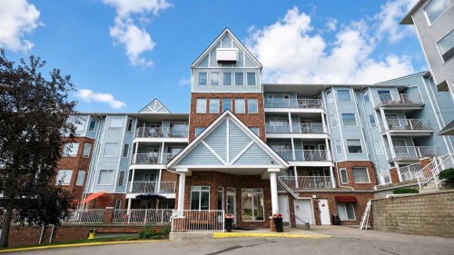 515-3515 Hawksbrow Point Nw, Calgary, AB - Outdoor With Balcony With Facade