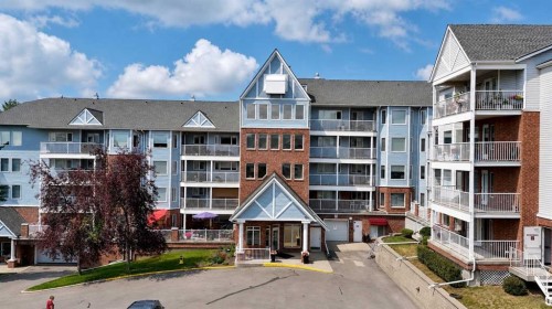 515-3515 Hawksbrow Point Nw, Calgary, AB - Outdoor With Balcony With Facade
