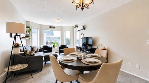 515-3515 Hawksbrow Point Nw, Calgary, AB - Indoor Photo Showing Dining Room
