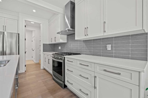 389 Crimson Ridge Place Nw, Calgary, AB - Indoor Photo Showing Kitchen With Upgraded Kitchen